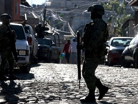 rival gang member flayed tortured and beheaded|Mexican police confirm grisly gang video showing bodies kicked .